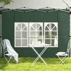 Green gazebo side panels with white multi-pane windows