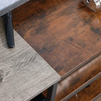 Close-up of brown wood-grain tabletop on an industrial TV stand with grey legs