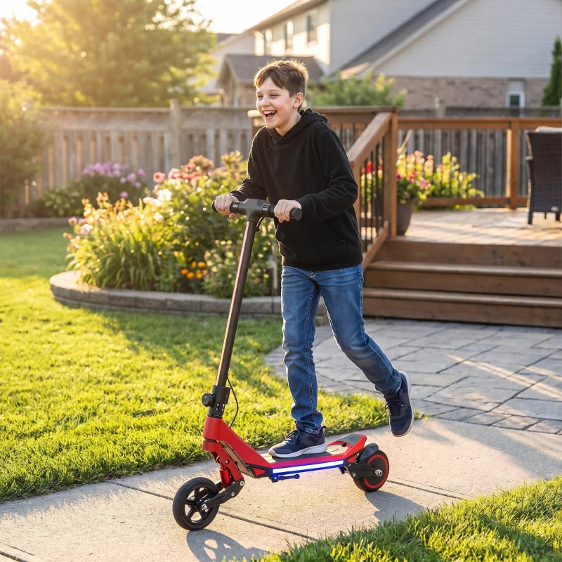 Red electric kids scooter ridden by a child with blue LED deck lights