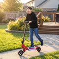 Red electric kids scooter ridden by a child with blue LED deck lights