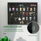 Black wall display cabinet with glass doors and groove handle, shown with ornaments inside