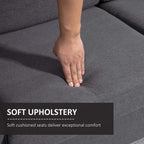 Dark grey upholstered loveseat cushion with soft, padded seating surface