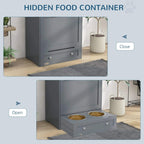 Grey pet feeder cabinet with hidden food compartment and raised bowls drawer