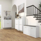 White shoe storage cabinet with chevron front and gold-tone legs, side view in a room