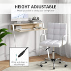 White faux leather office chair with adjustable height and matching desk with shelf