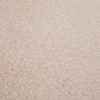 Close-up of beige soft fabric lining on cat tree hammock bed