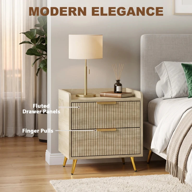 Natural wood bedside table with two drawers, fluted panels, and gold metal legs