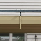 Close-up of retractable pergola bracket and khaki canopy underside