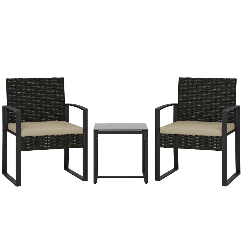 Rattan bistro set with two dark wicker chairs and a square glass-top table, tan cushions