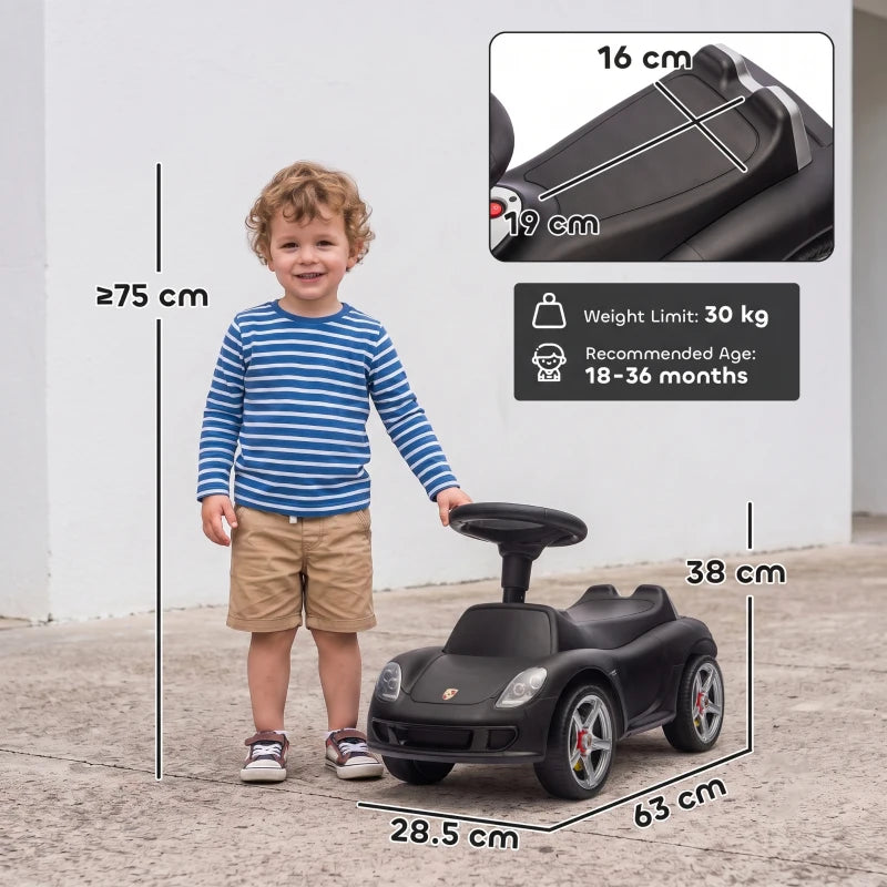 Matte black ride-on push car with seat and steering wheel, front three-quarter view