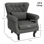 Dark grey Chesterfield-style accent chair with tufted back and studded armrests