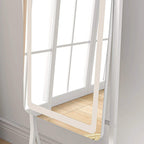 White full-length mirror close-up showing curved frame edge and reflective glass