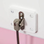 Pink toy box bench close-up of safety rod bracket and hinge hardware