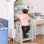 Kids step stool ladder in grey and light blue with a child climbing