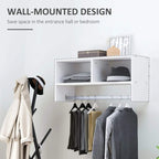 White coat organizer wall rack with shelves and hanging rail holding coats