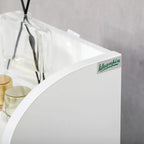 White cabinet with curved top edge and small brand label on the door