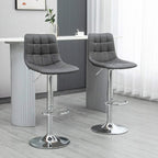 Set of 2 grey PU leather bar stools with square tufted back, swivel, chrome footrests
