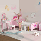 Kids pink vanity table with mirror and matching stool, with a pink princess bed