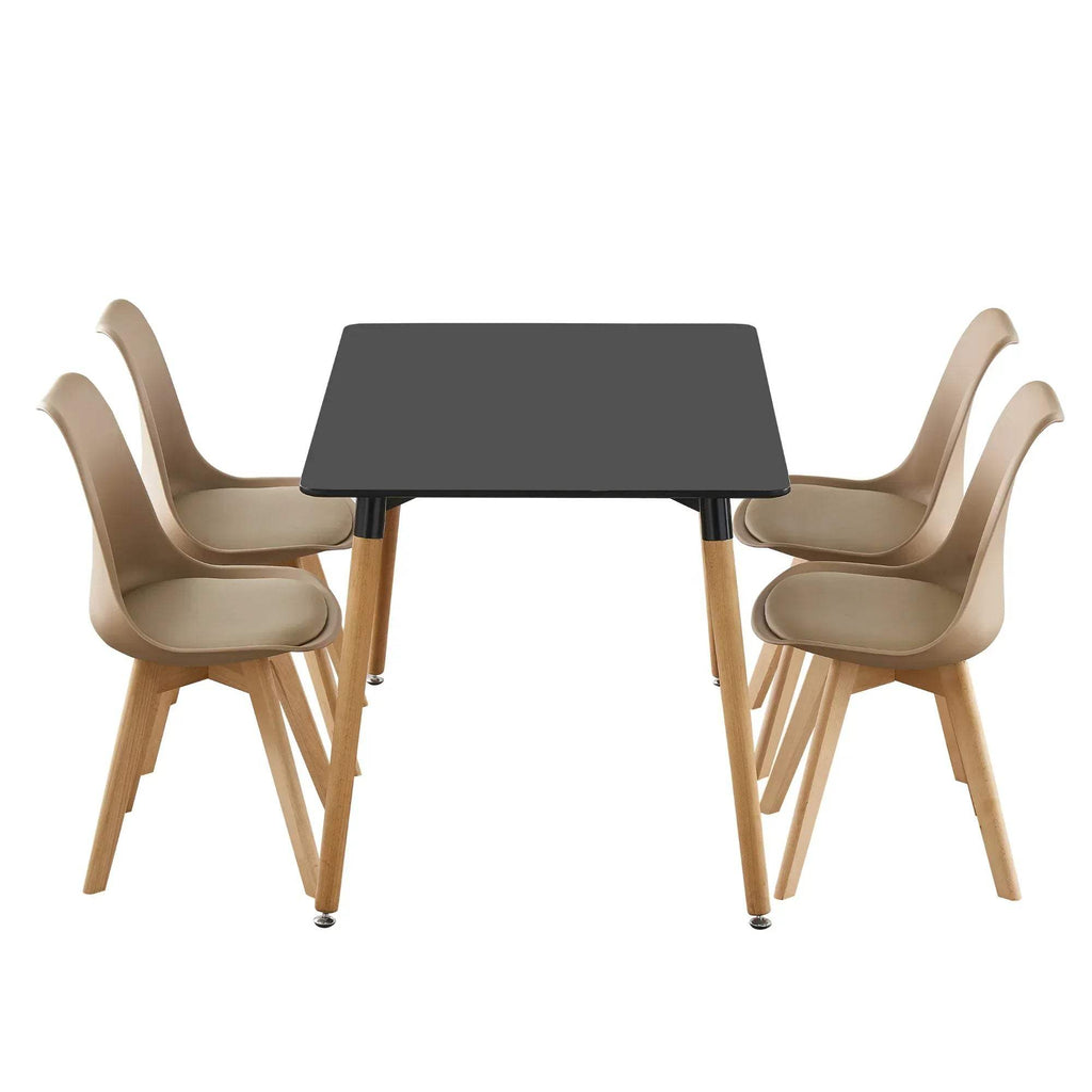 Dining table with tulip chairs, padded seats, dark tabletop, light wood legs