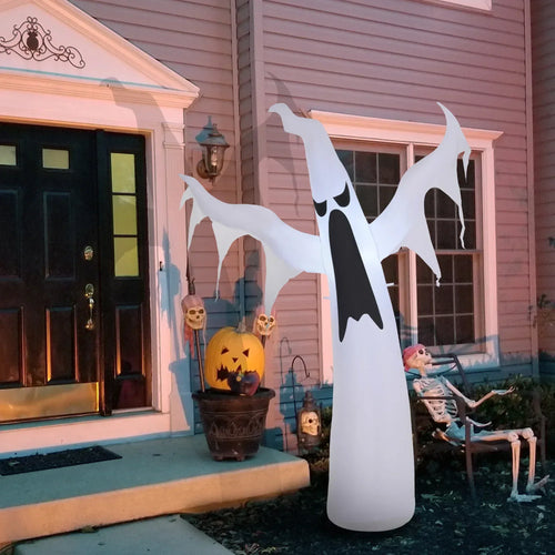 White inflatable ghost decoration with black face and extended arms