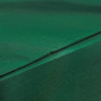 Green swing chair cover fabric close-up with reinforced seam and edge stitching