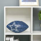 White open cube compartment in a 9-cube storage unit with a blue star cushion