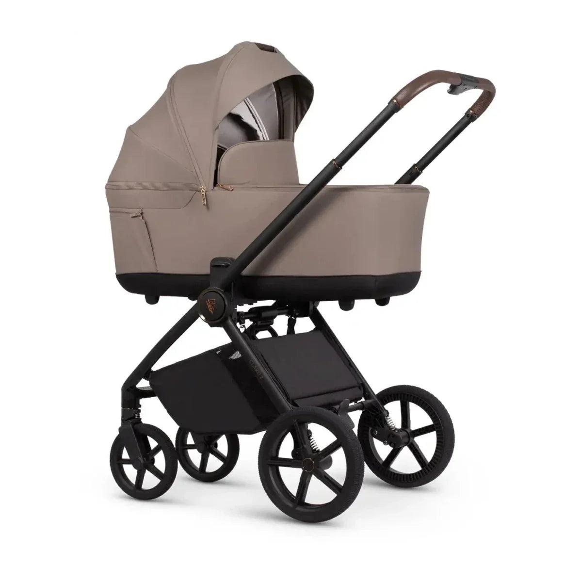Almond stroller carrycot with hood, black chassis, and front wheels