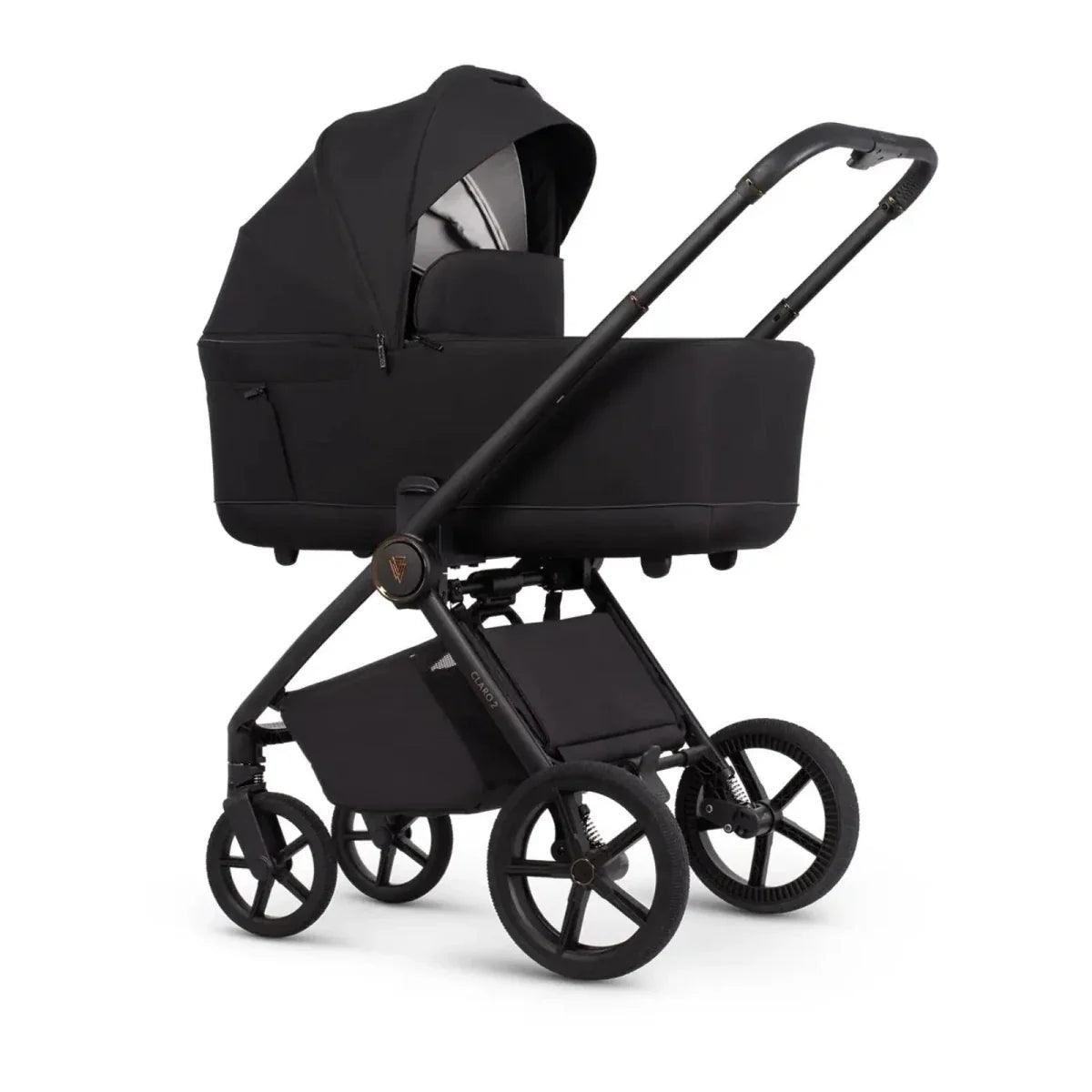 Black 2-in-1 stroller with carrycot, seat unit, and large wheels