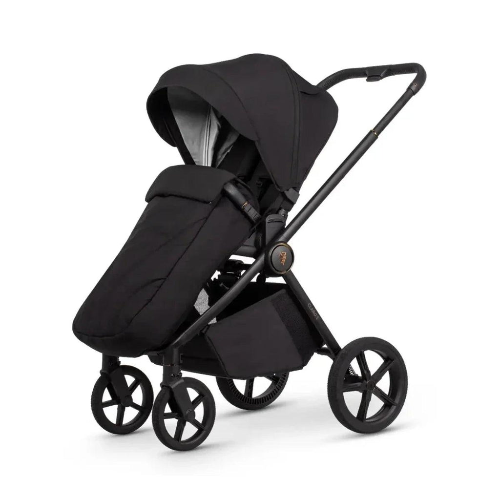 Black 2-in-1 stroller with carrycot and seat unit, angled side view