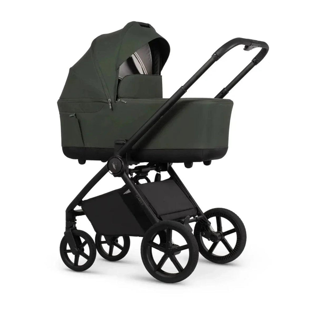 Forest 2-in-1 stroller with carrycot attachment and black wheels, standing angled view.