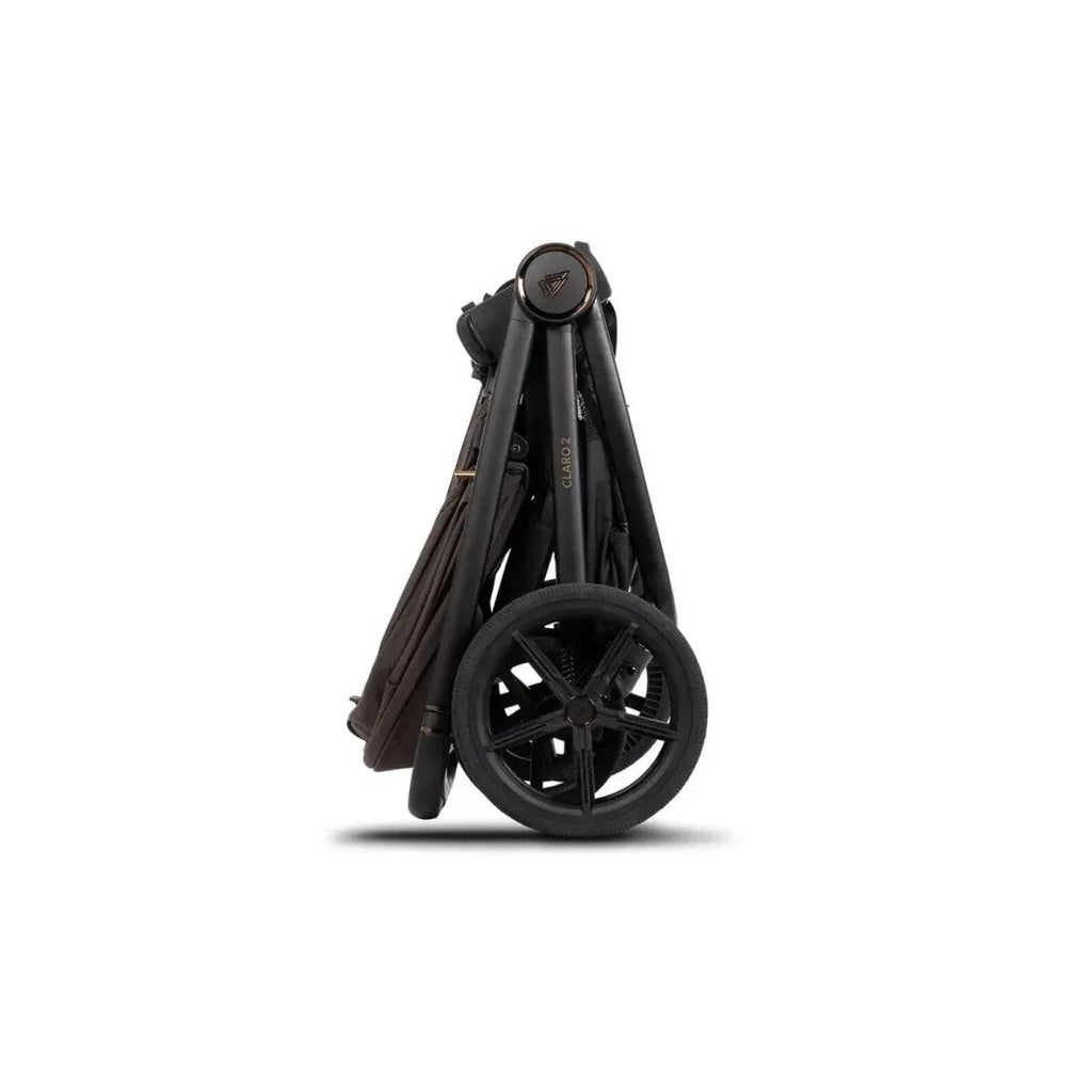 Compact folded stroller frame with wheels and attached carrycot/seat fabric panels
