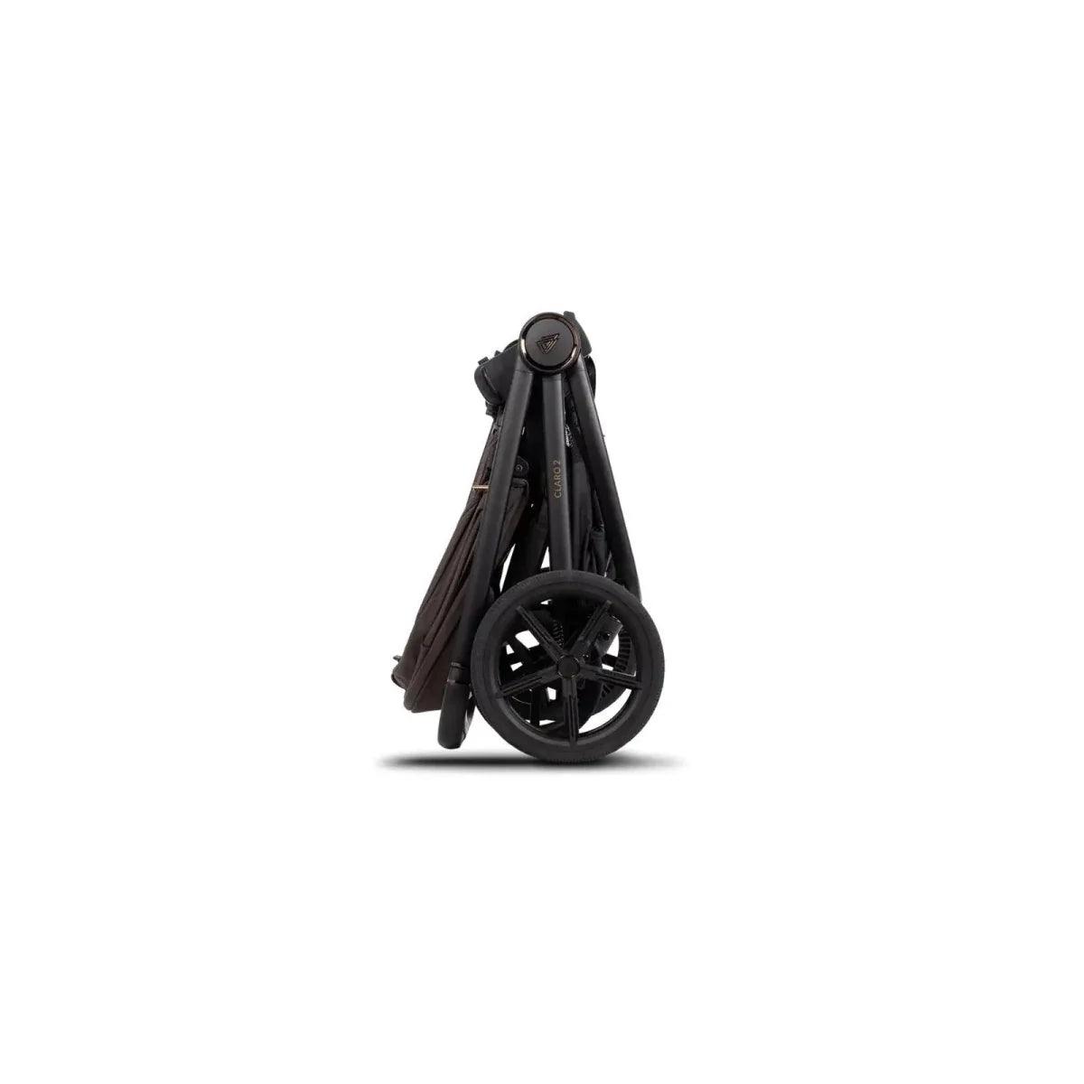 Folded stroller frame with hood and wheels, dark brown fabric and black frame
