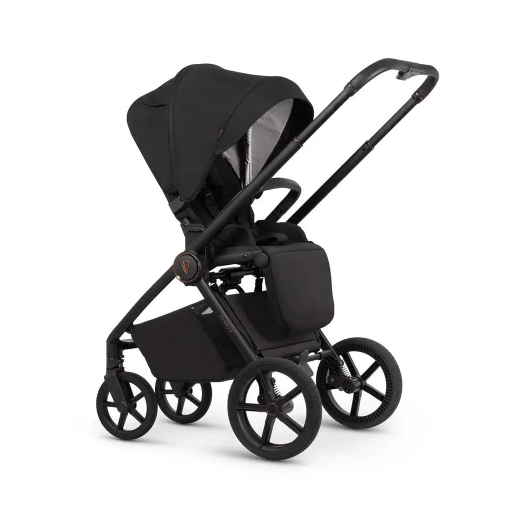Black stroller with carrycot attachment, front 3/4 view