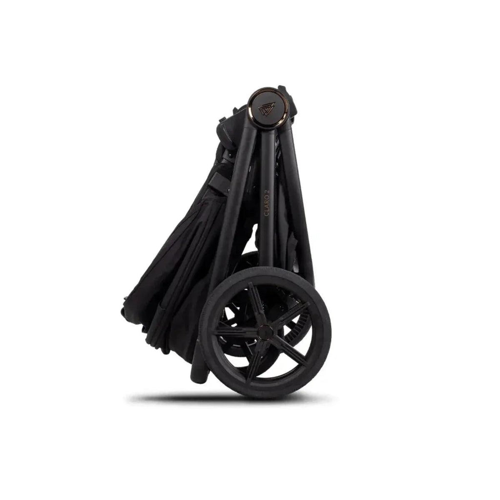 Folded black stroller frame with wheels