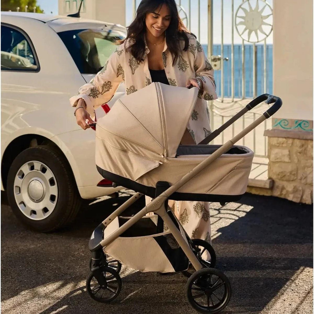 Sand 2-in-1 stroller with beige carrycot and seat, black frame