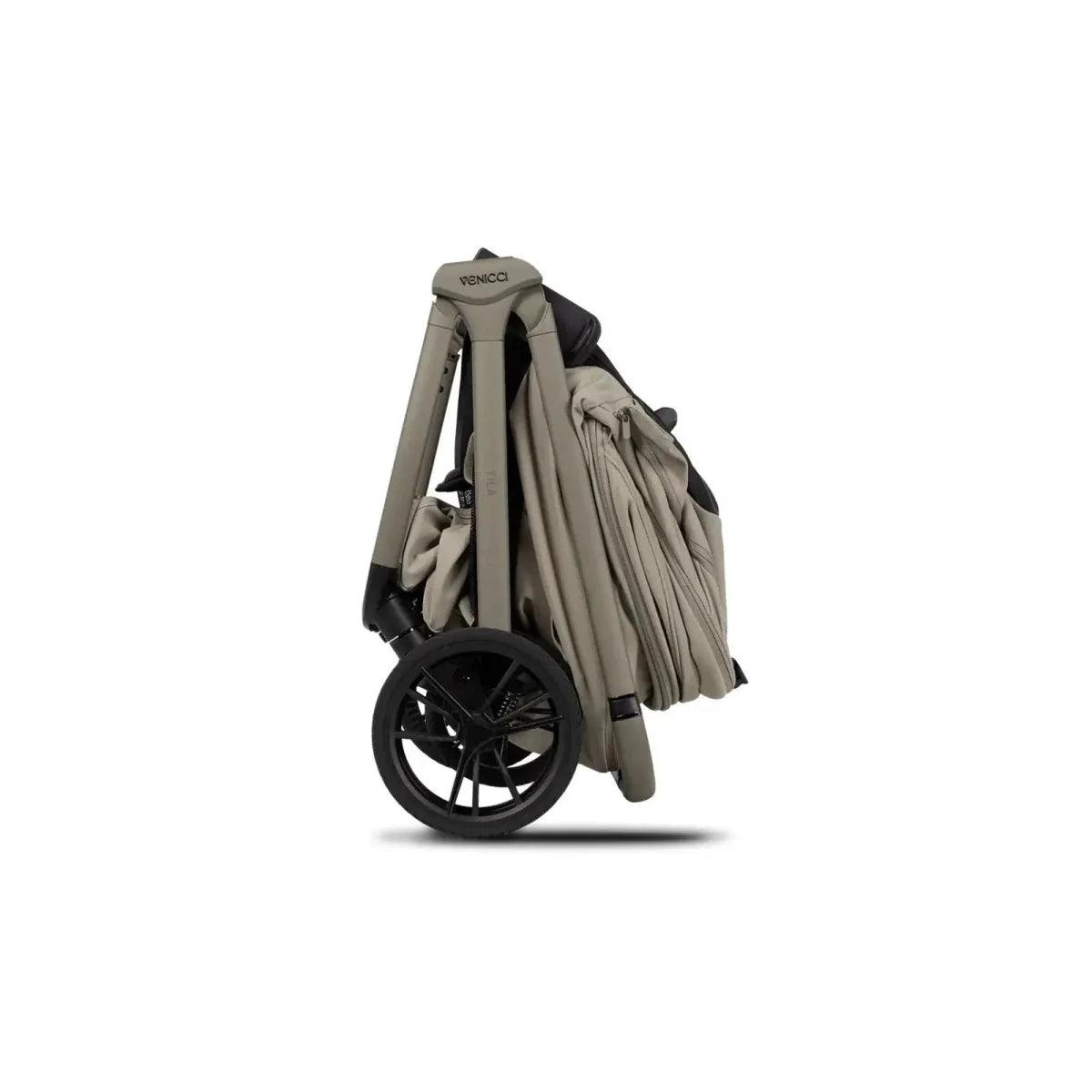 Beige stroller with carrycot canopy and wheels, angled side view