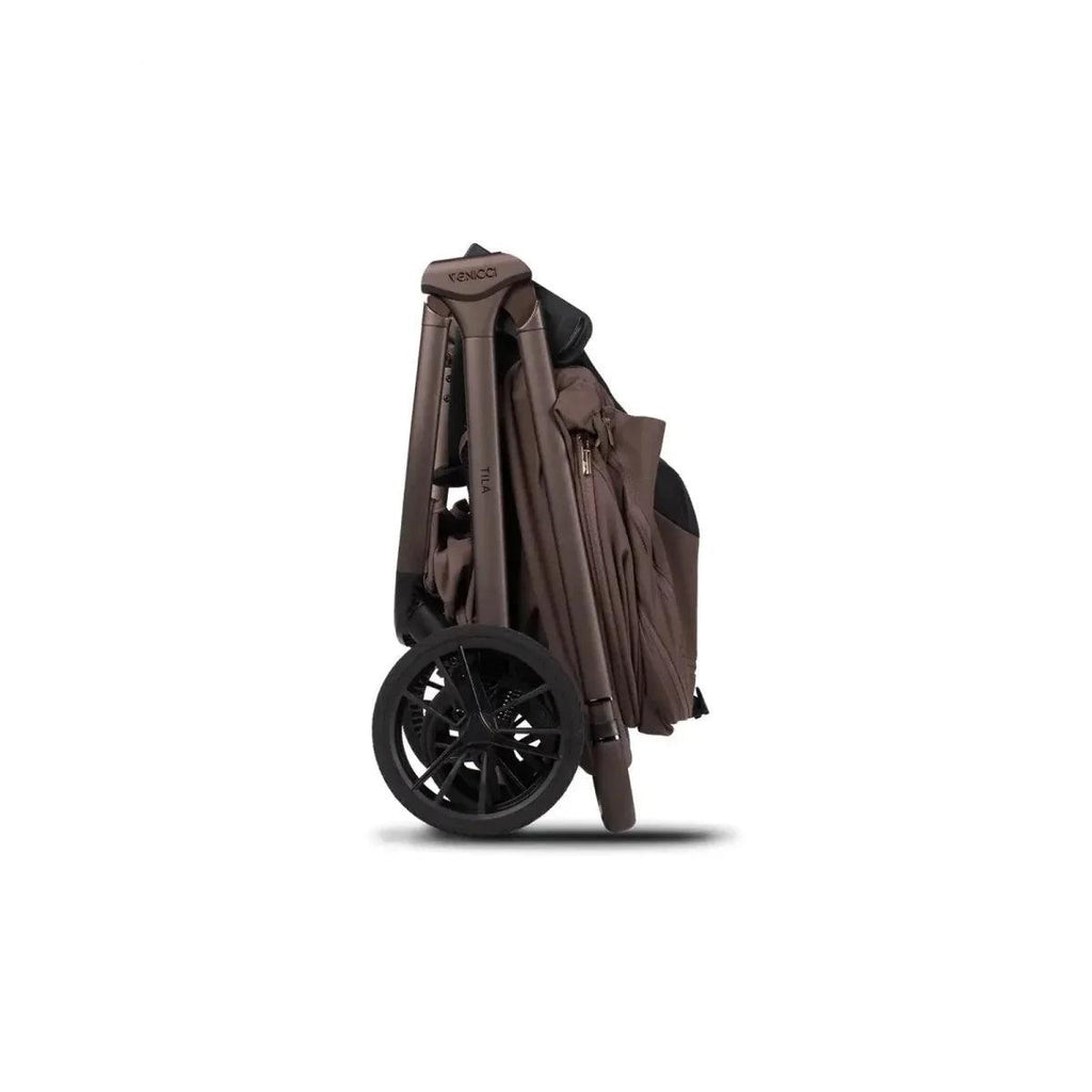 3-in-1 stroller with seat and carrycot, side view in brown and black