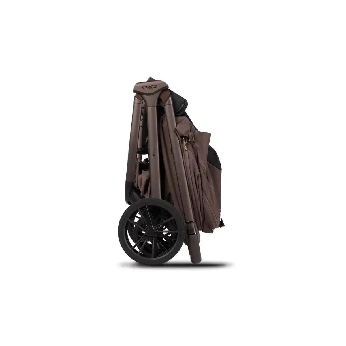 Beige-brown stroller with canopy and folded side frame