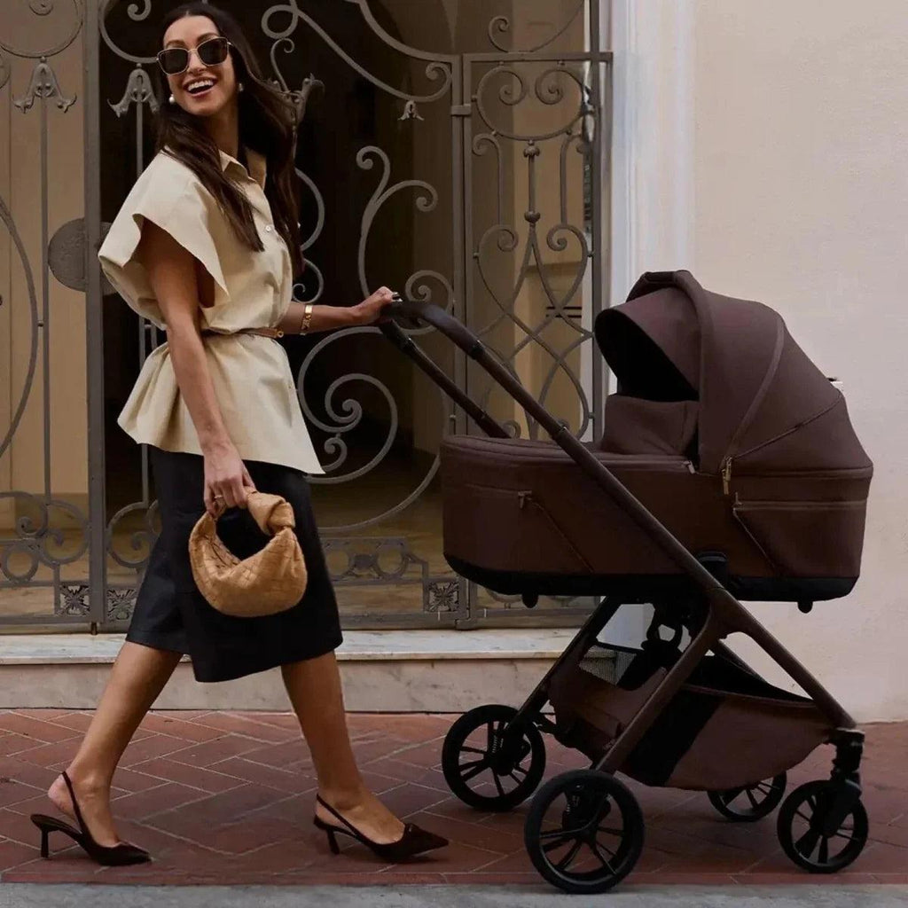 Side-view stroller with canopy and carrycot, dark frame with brown seat