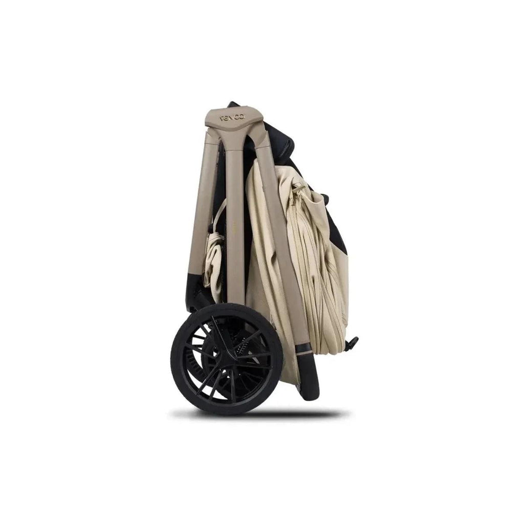 Beige and black stroller bundle with folded seat, rear side view on wheels