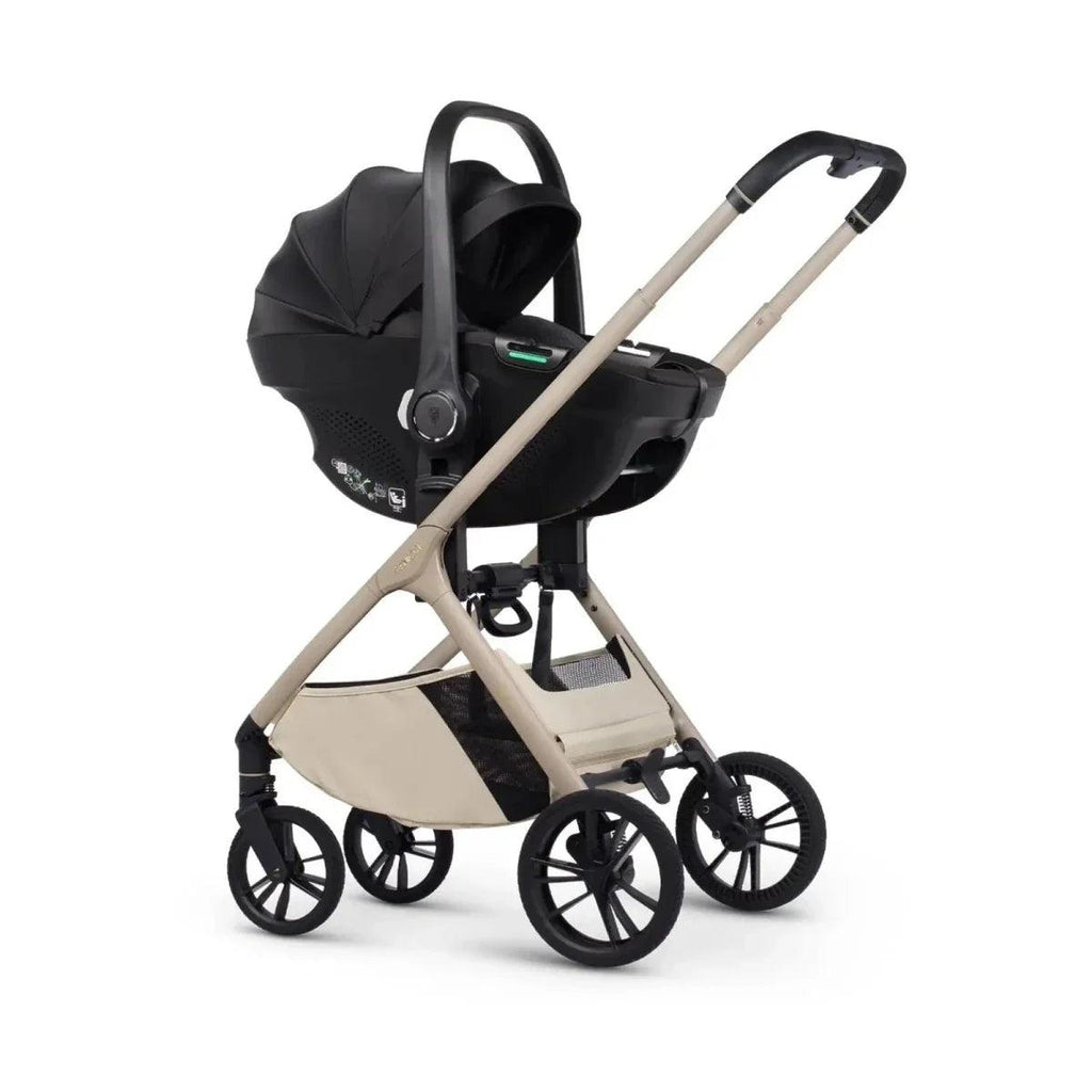 Black stroller seat with beige frame and canopy, front three-quarter view