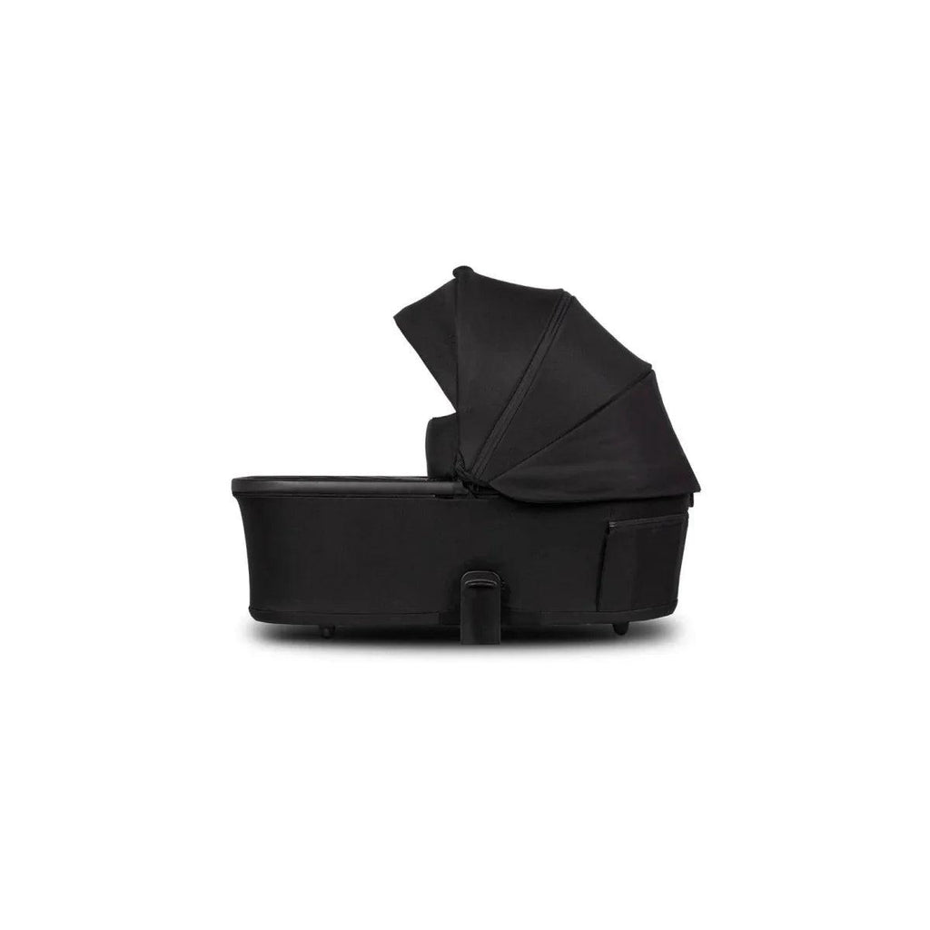Black carrycot base with side handle and canopy cover