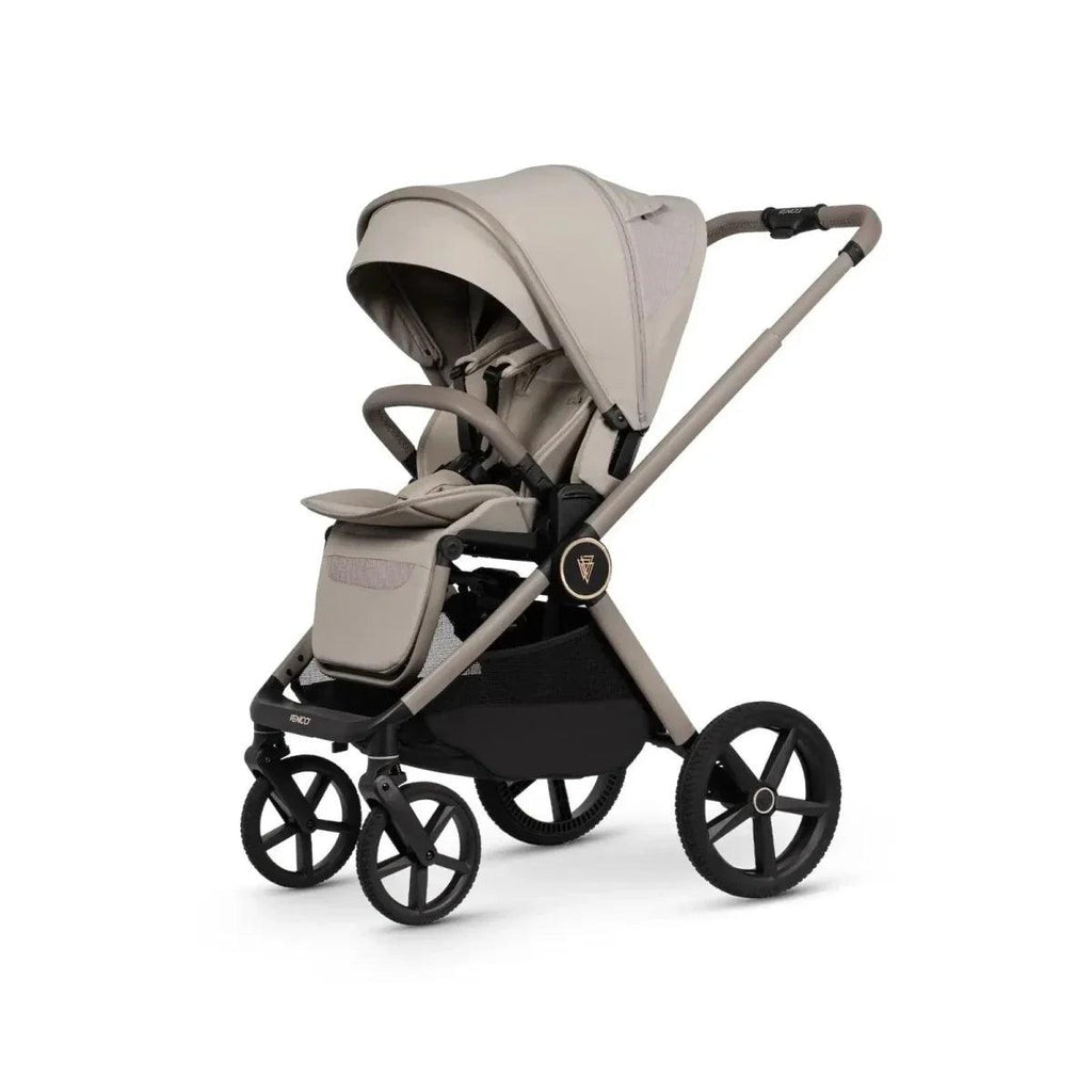 Pebble baby stroller with beige seat, canopy hood, and black wheels, angled view