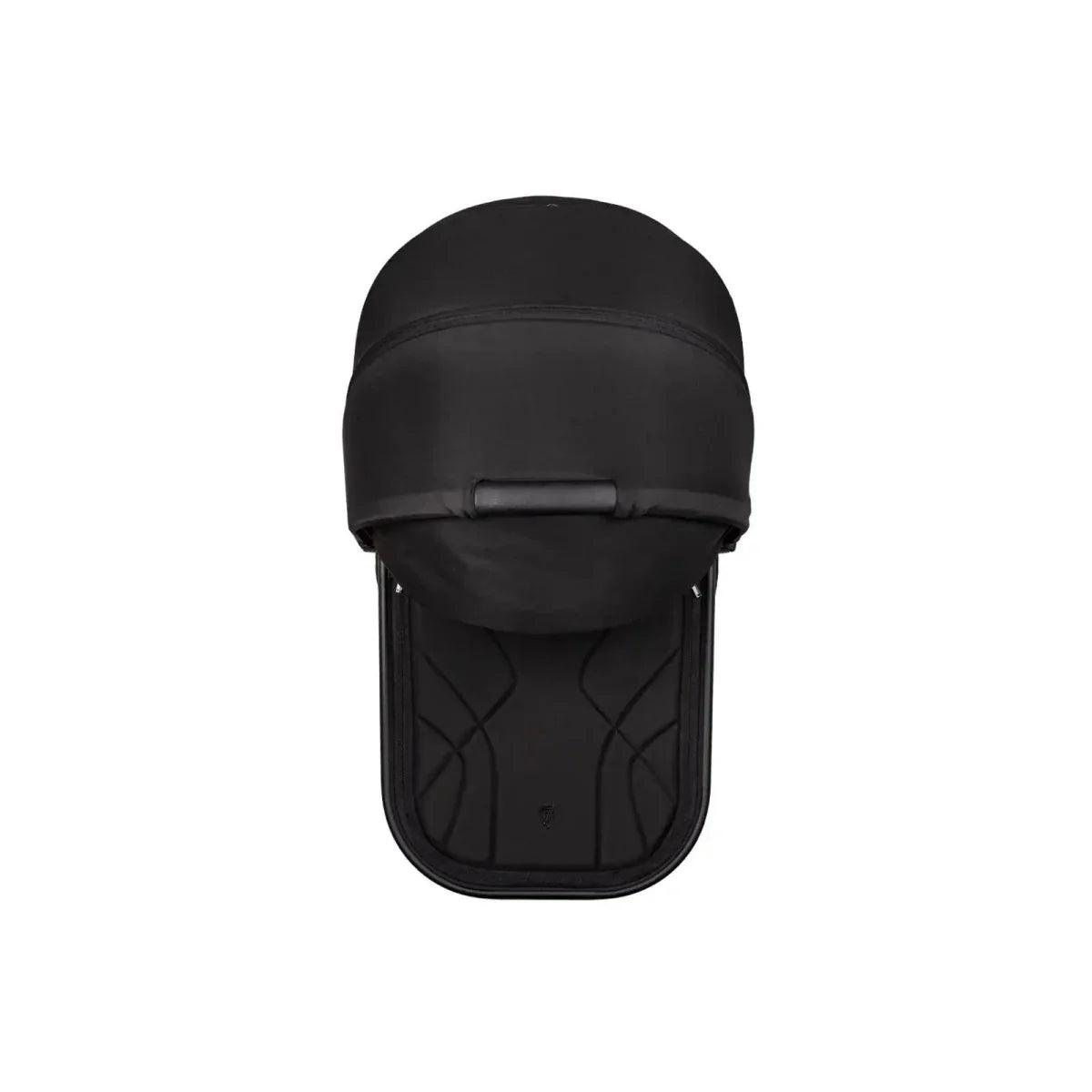 Black stroller carrycot with hood and padded interior