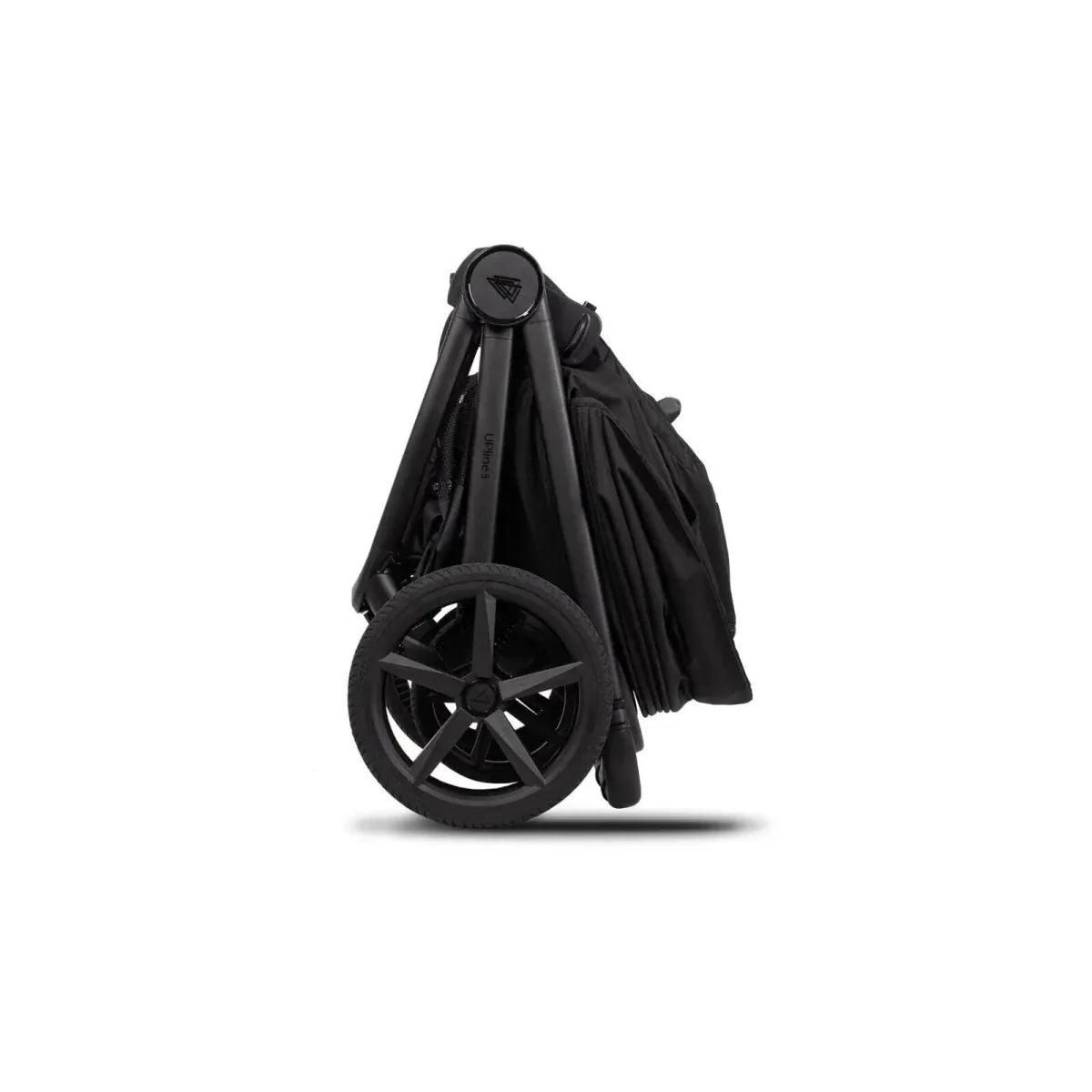 Black stroller frame with folded seat and canopy