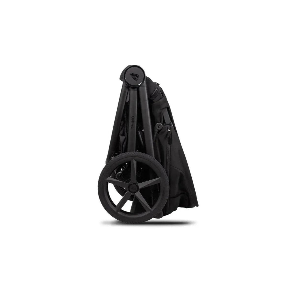 Black stroller frame with wheels and canopy in folded position