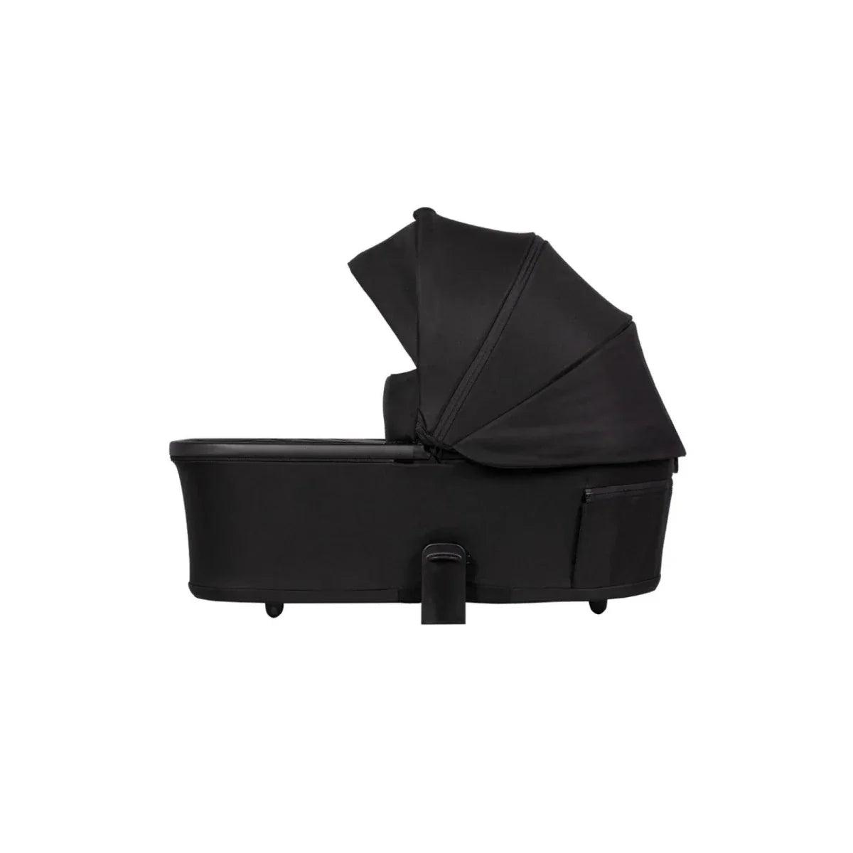 Black carrycot with canopy and integrated carry handle
