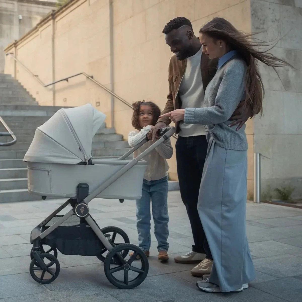 Light blue stroller bassinet with canopy and five-point wheels