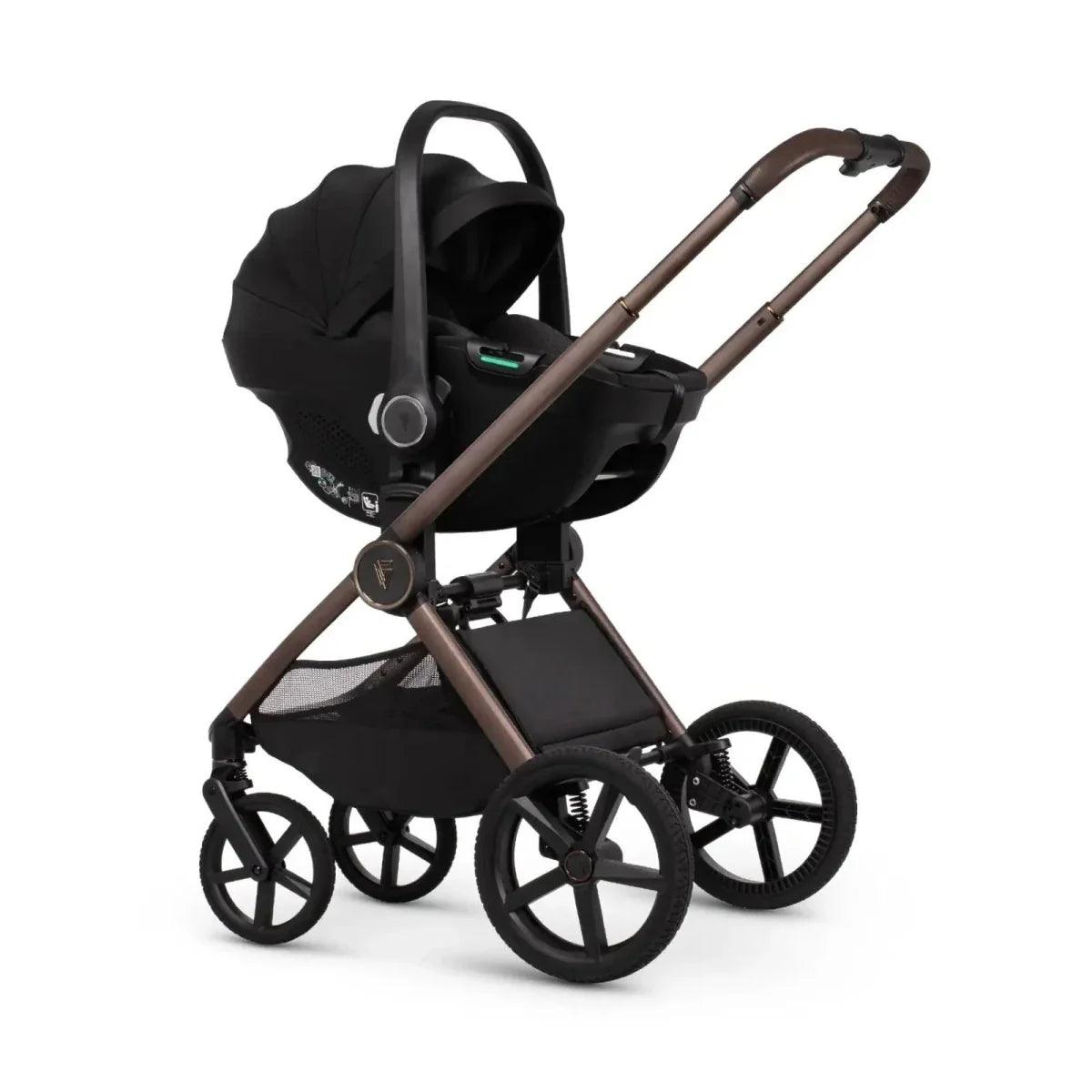 Infant car seat stroller attachment with black carrier and sand canopy