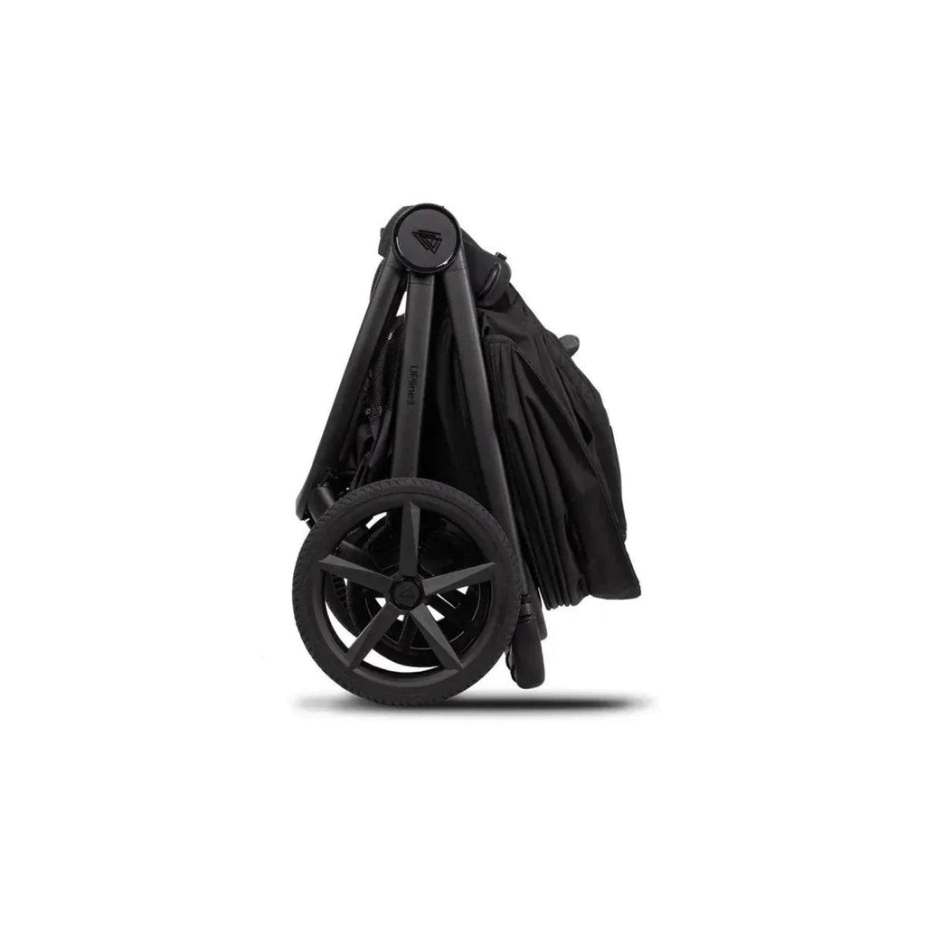 Black stroller in folded position with wheel set and attached fabric canopy